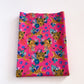 LYCRA DUPONT SUBLIMADA LEOPARDO Y FLORES FONDO FUCSIA FUERTE